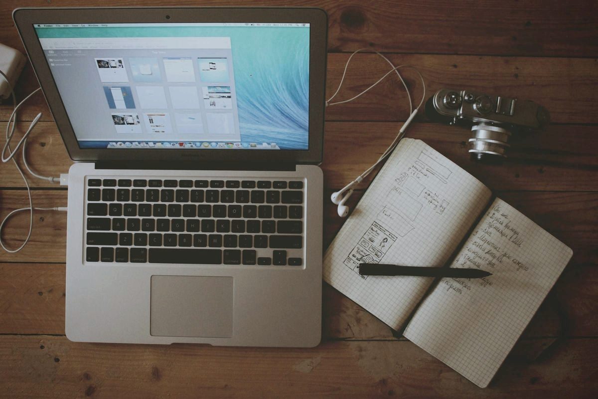 A live website on screen, designed by EXLUMA